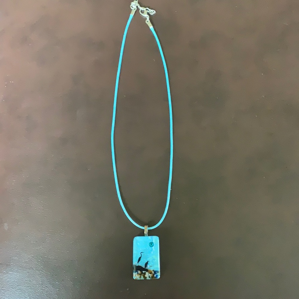 5/$25 Light teal/blue glass bird pendant w/ Lobster clasp